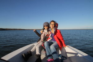 Guests enjoying boat tour on the Great Slave Lake with North Star Adventures