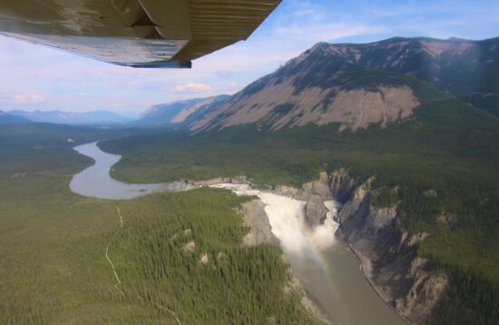 Flying over Virginia Falls on our Mackenzie Nahanni Package in the Nahanni National Park with North Star Adventures