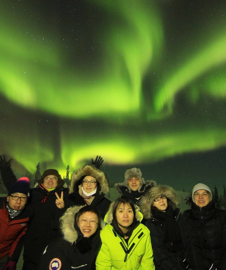 guests enjoying the aurora borealis on north star adventures aurora hunting tours