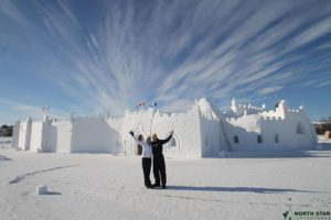 Guests enjoy the wonders of the Snow Castle in Yellowknife with North Star Adventures