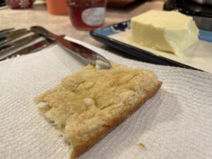 Guests enjoy fresh bannock on our Traditional beading and sewing workshop in Yellowknife with North Star Adventures