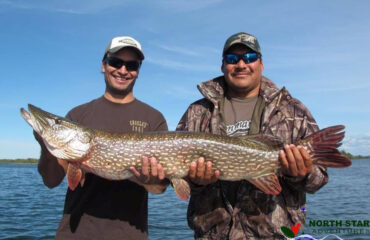 fishing charter on the great slave lake, happy clients on north star adventures fishing tours