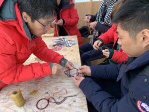 Guests making their own Dreamcatcher in Yellowknife with North Star Adventures